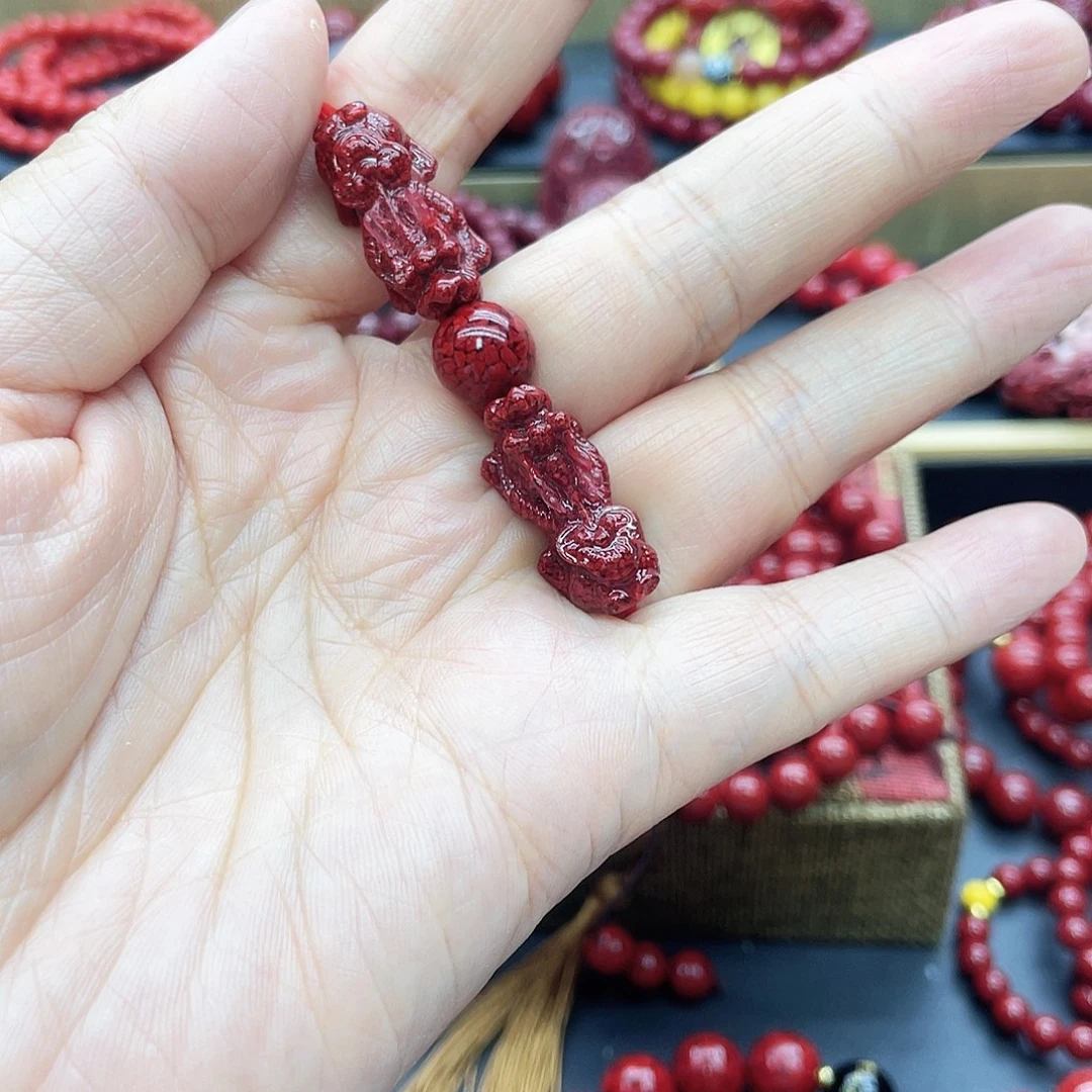 天然辰砂卡10双貔恘加一颗珠子