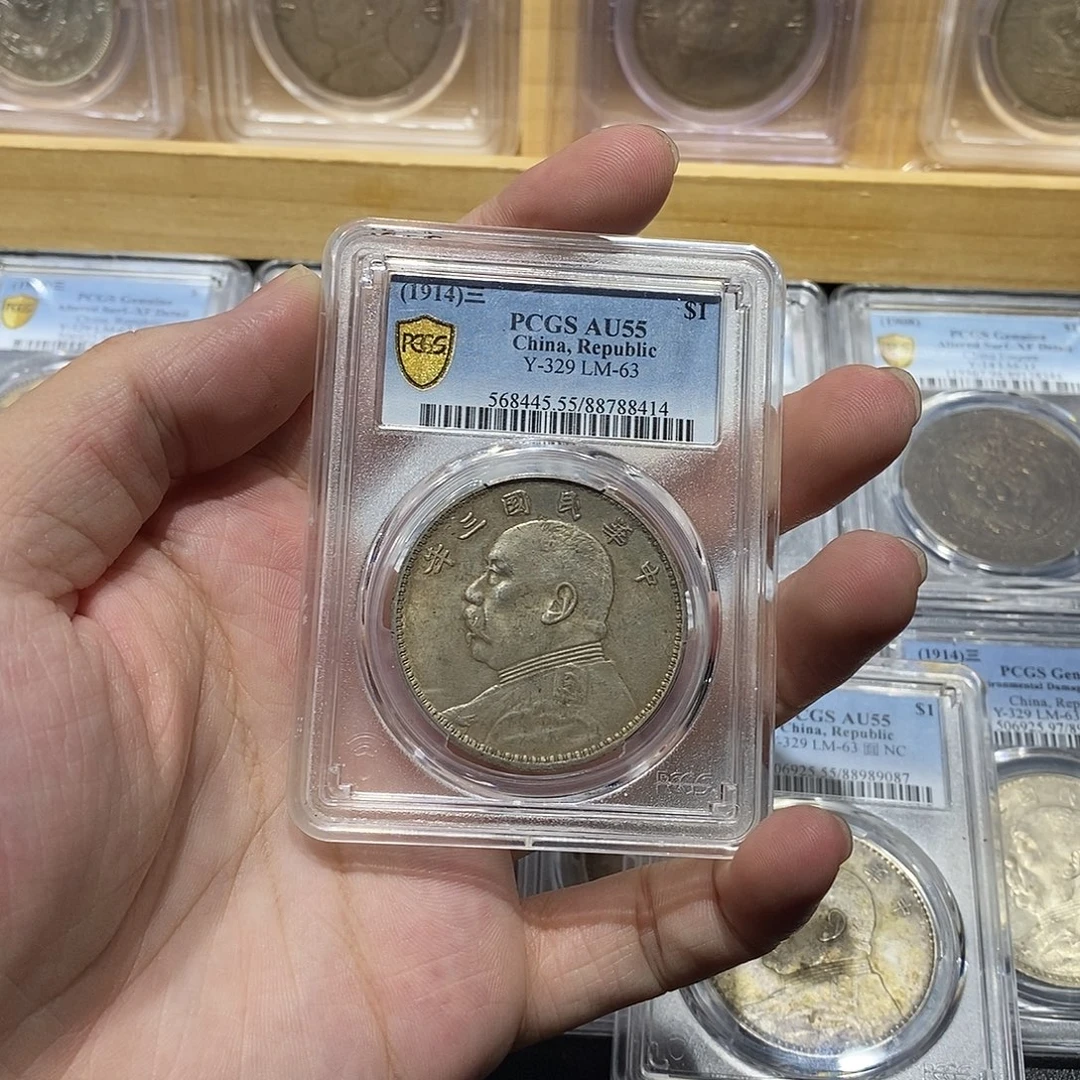 依***樂银PCGS原光三角圆8414