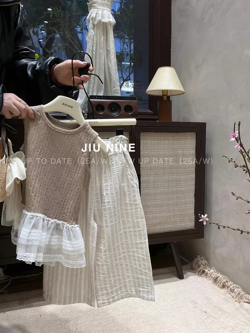 9nine （no退换 介意勿拍）66295两色屁帘背心上衣