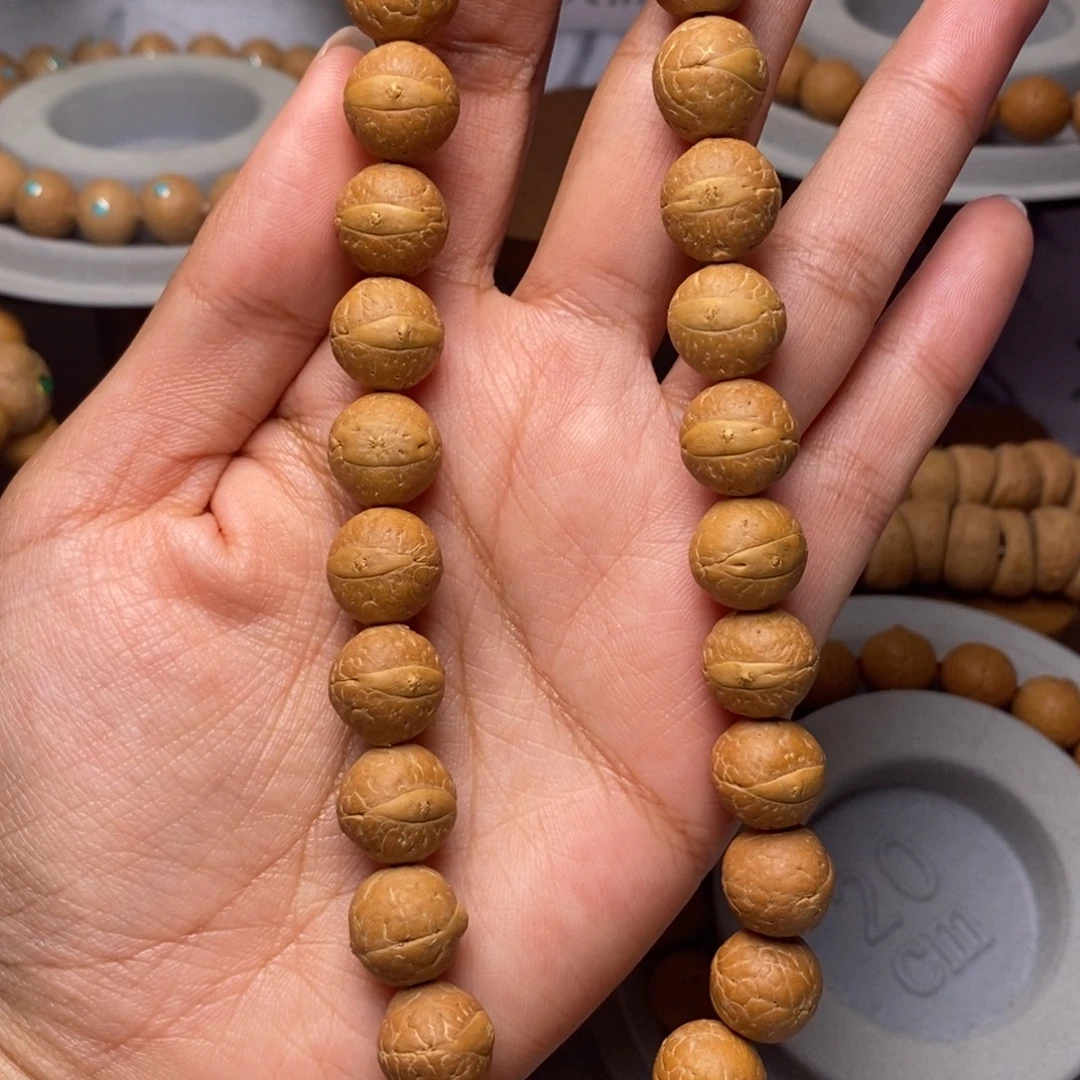 凤眼菩提吊坠手持