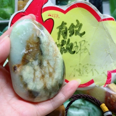 未镶嵌蛇纹石玉手把件