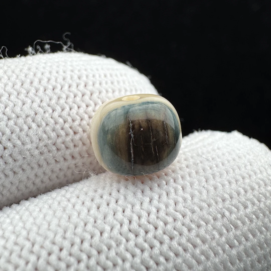 D4767天然猛犸牙精品蓝眼珠 8.9*7.7mm支持鉴定 假一罚四