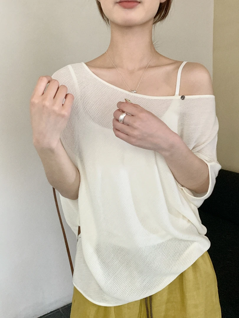 【潘潘.978852】2025年夏季新款冰蚕丝纯色圆领斜下摆套头针织衫
