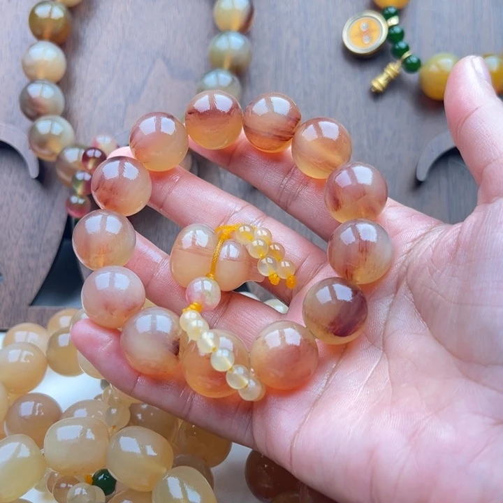 灿***灿非金属珐琅18粉血手串