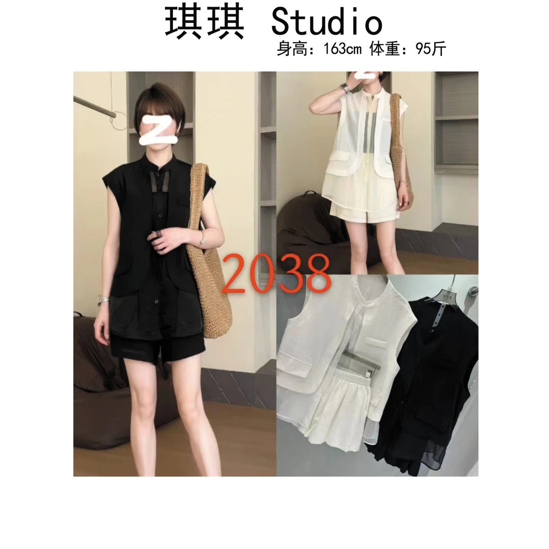 《琪琪家》夏季新款气质时尚舒适亲肤拼排扣上衣短裤两件套2038-CS