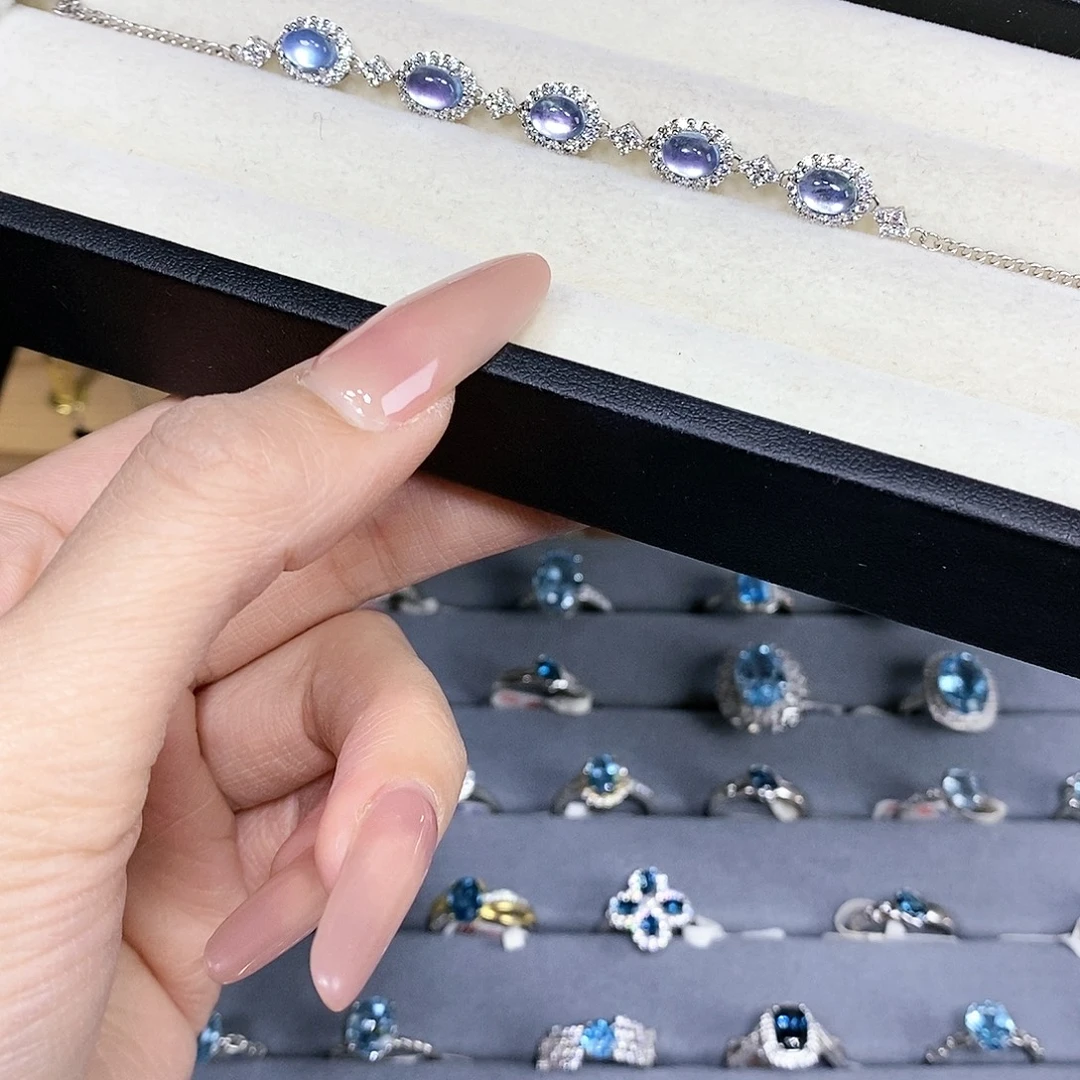 V***s碧玺猫眼银S925镶嵌耳饰