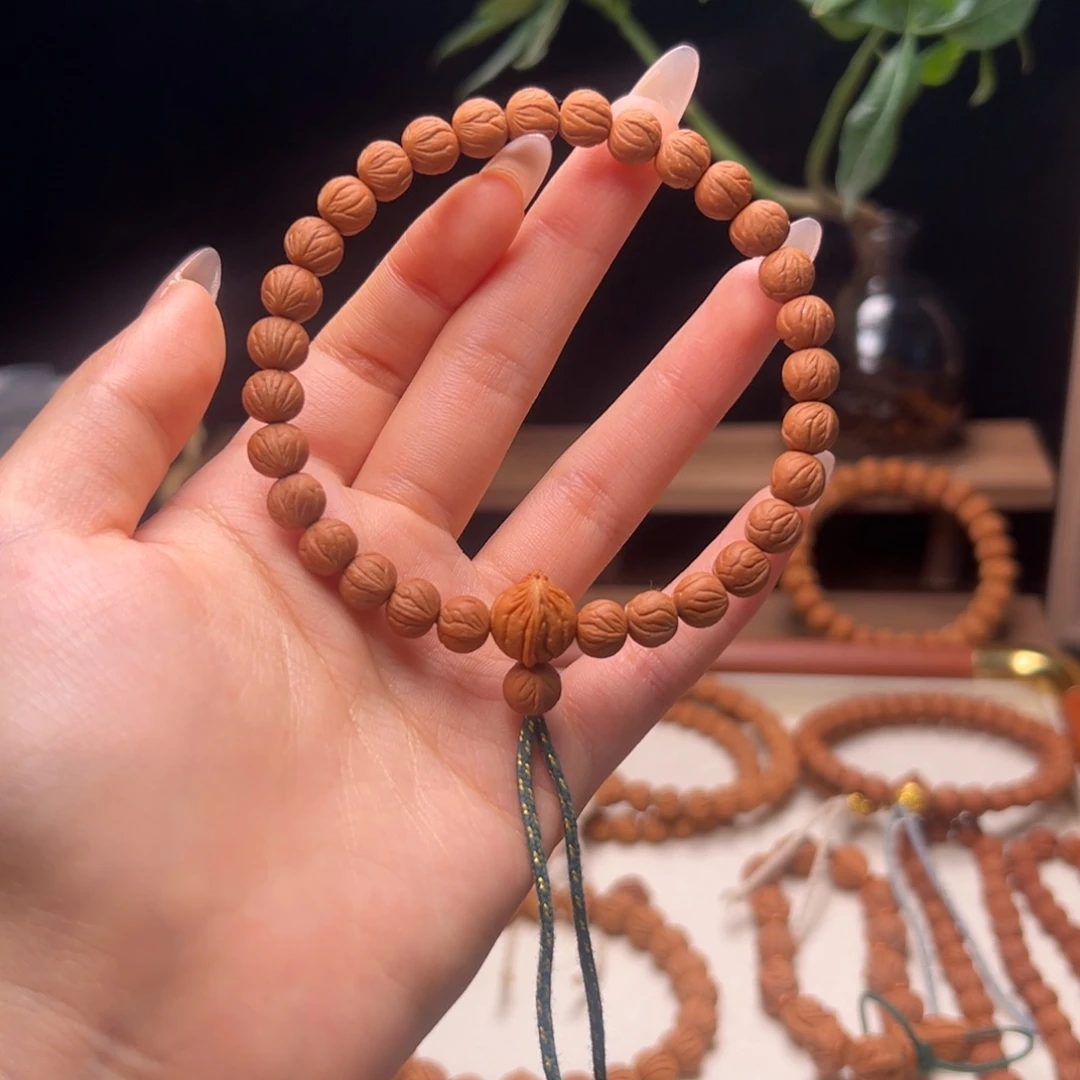 小***呦木质类陕西龙纹桃核8.1