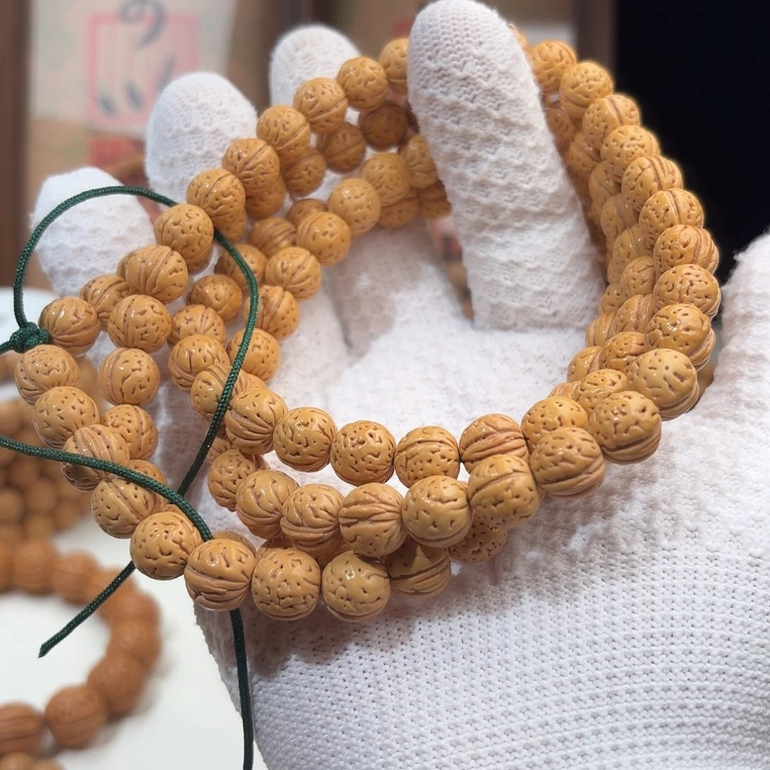 小***瑞手串桃核1.1小黄桃脖挂