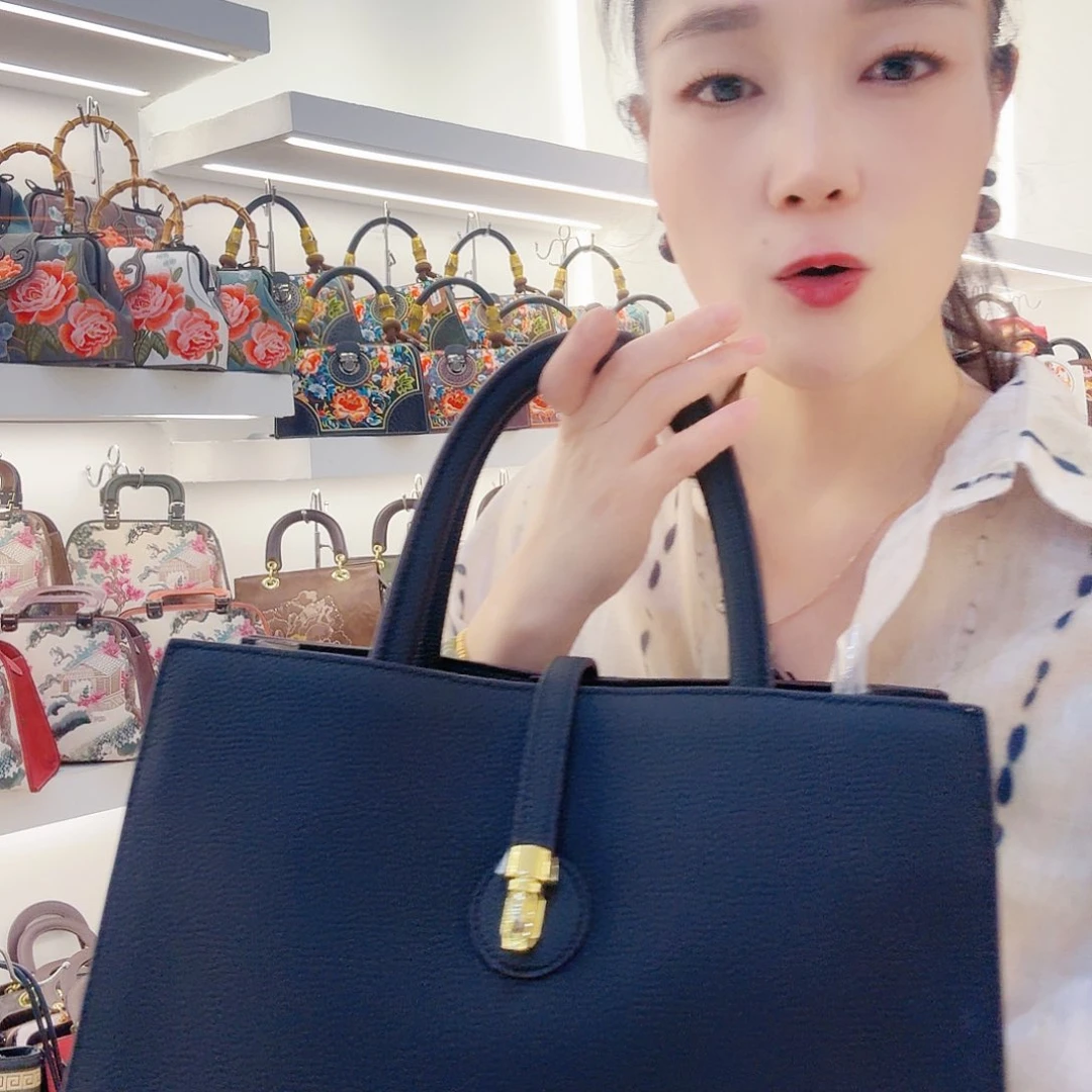 猪剖层皮革牛皮手提黑色包包