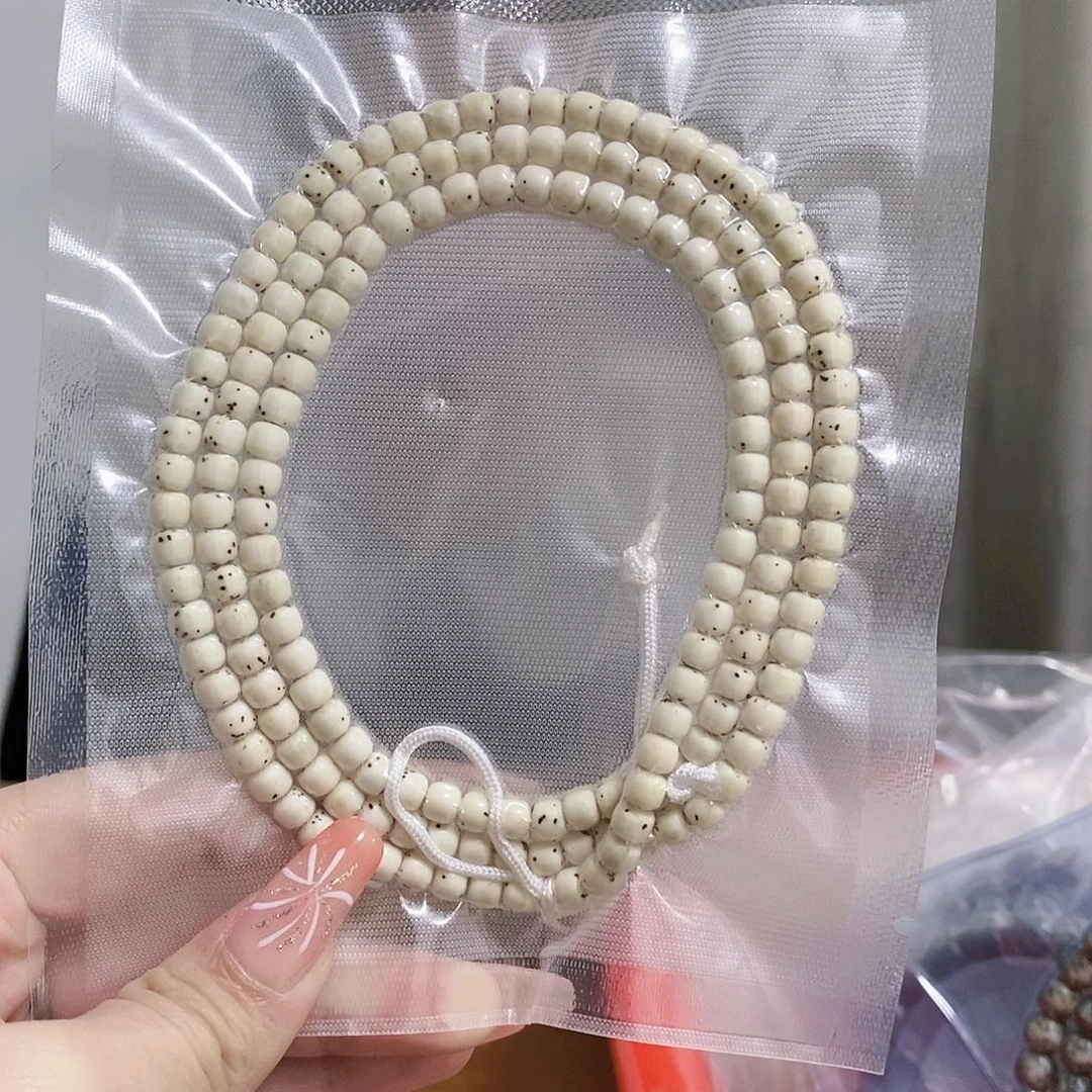 星月菩提手串海南原生态星月菩提原白数星星长串5.4