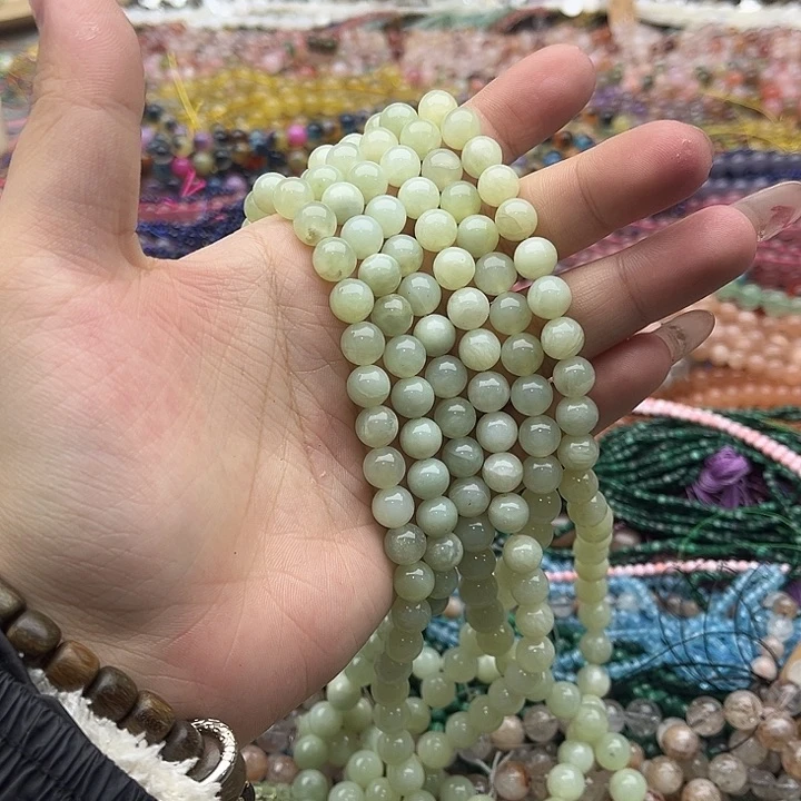 玛瑙/玉髓珠宝半成品未镶嵌一条8mm左右岫玉几颗有瑕