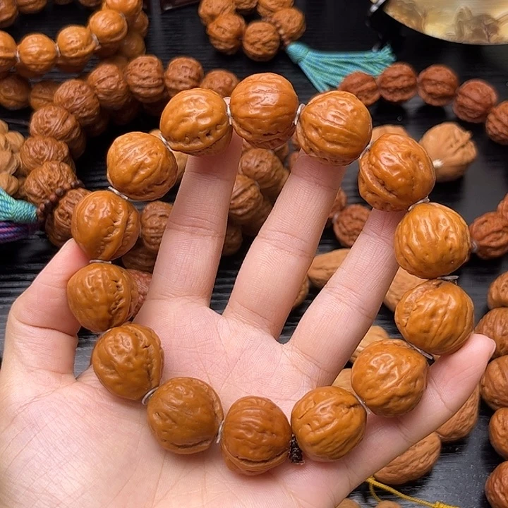 吊坠桃核黄皮光头