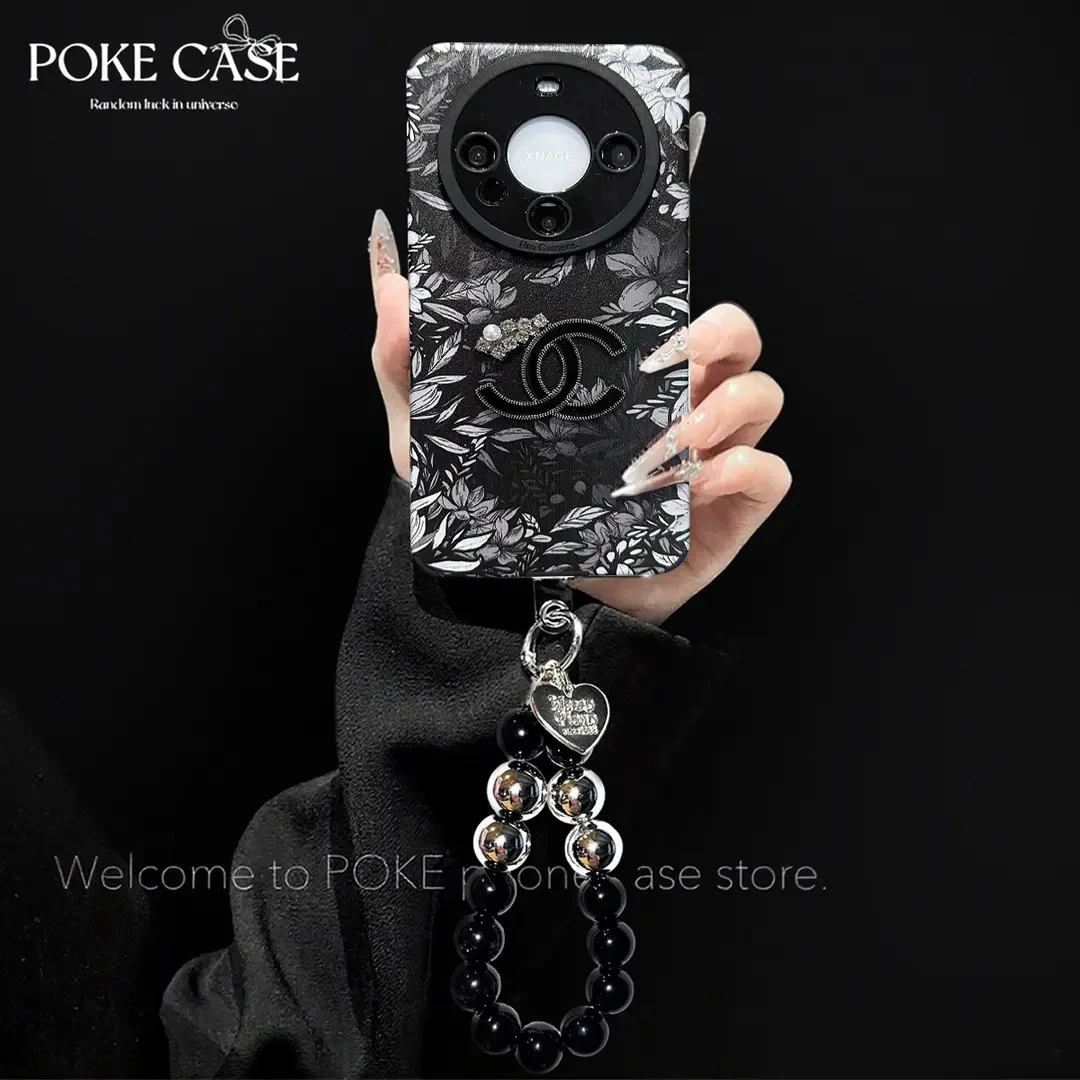 轻奢瞳眼翻毛皮花洞适用于华为mate60苹果vivo小米oppo手链手机壳