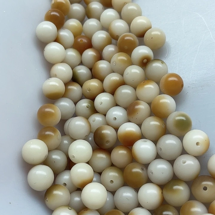 白玉菩提吊坠瑕疵11绿炭烤圆珠110颗