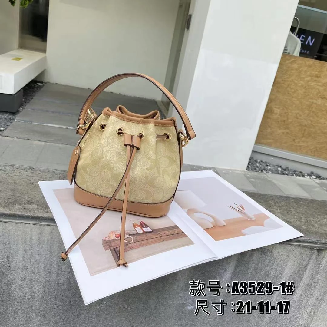 开口笑印花简约风荔枝纹单肩包肩包云朵包竹节小众单肩水桶包女士