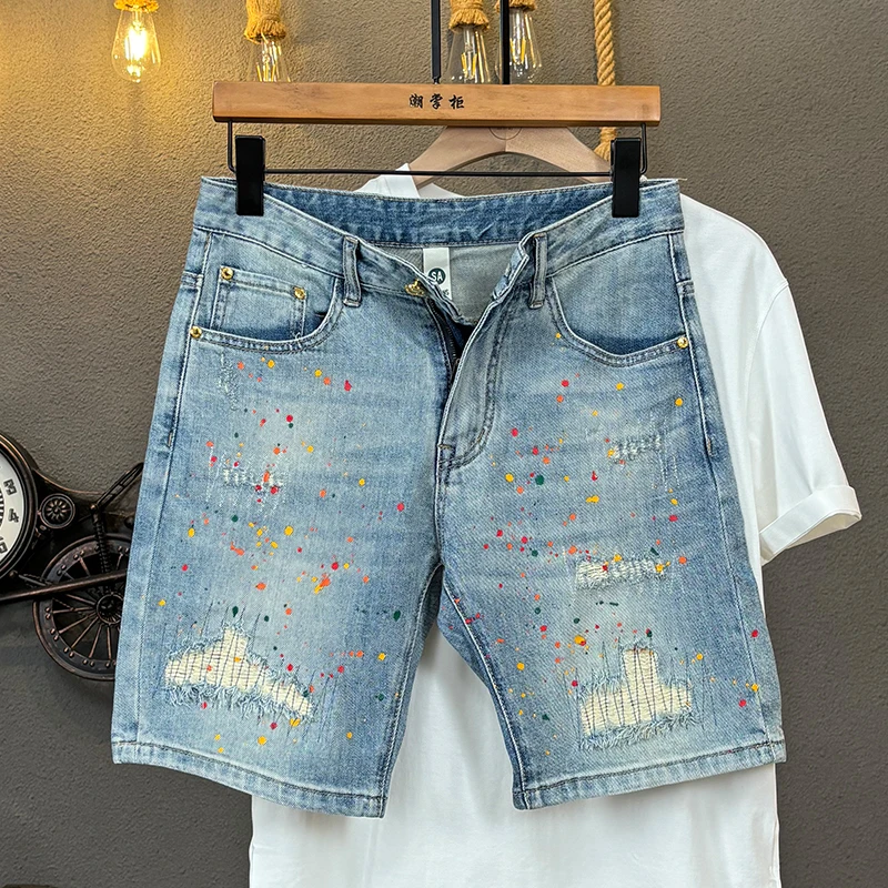 潮掌柜夏季宽松复古潮流高街牛仔裤休闲刮烂牛仔裤印花牛仔短裤男