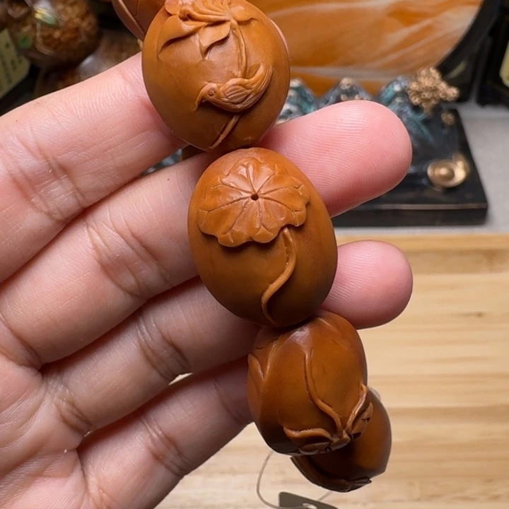 宁***远橄榄核手串/手链荷韵