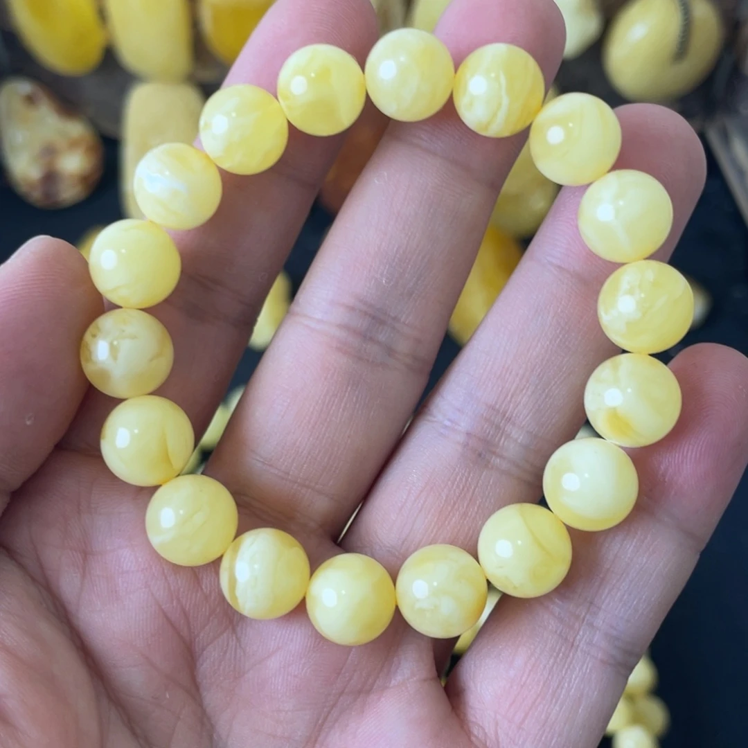 琥珀未镶嵌手串10+俄料黄白妖花圆珠手串