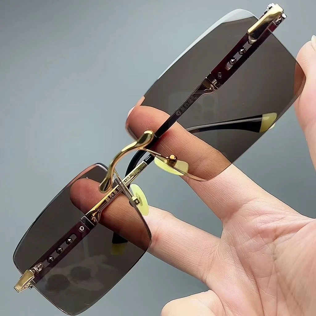 太阳镜无框设计高清养眼商务金色镜架护目眼镜高档茶色石头镜