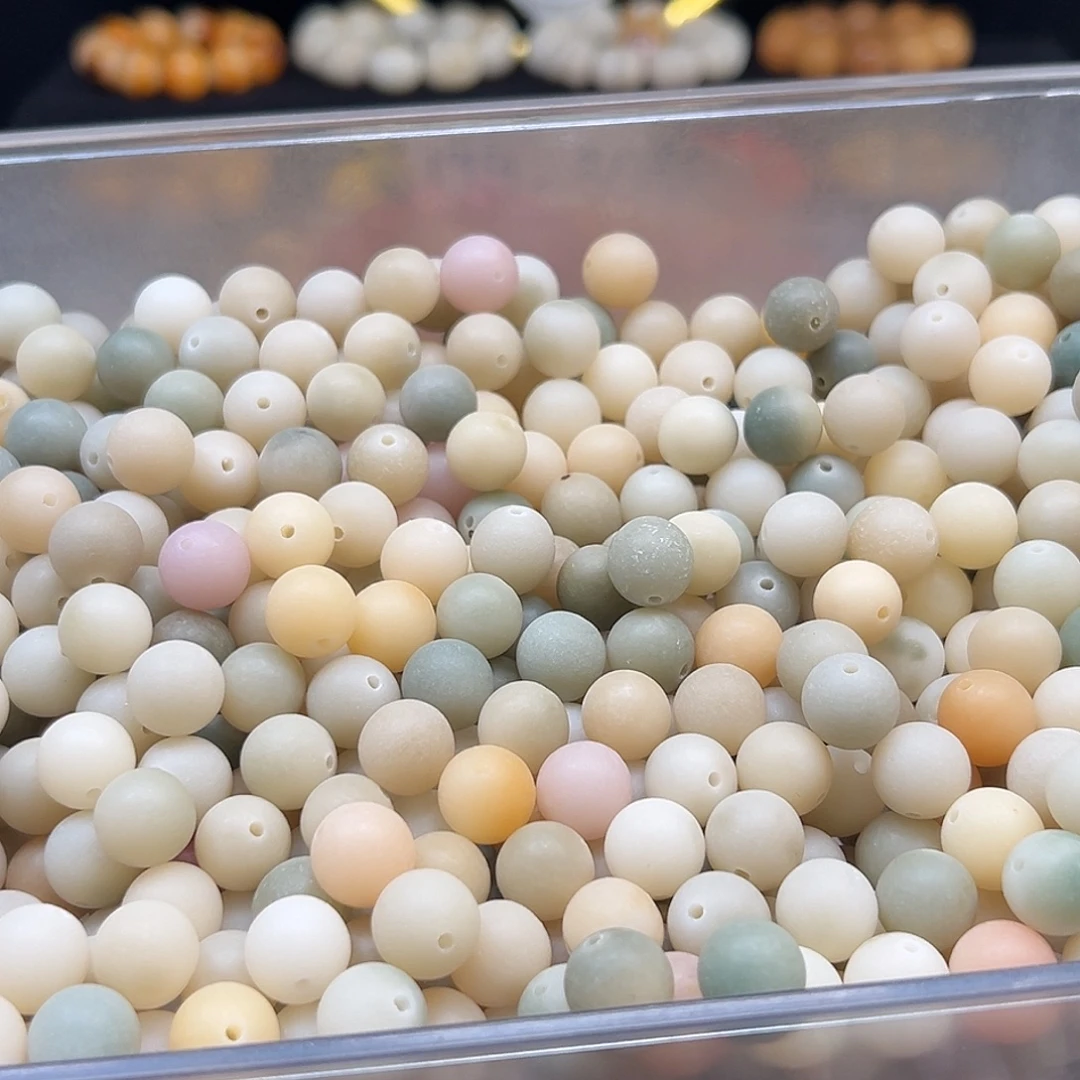 菩提根/象牙果手串微瑕12磨砂浅多宝圆200颗