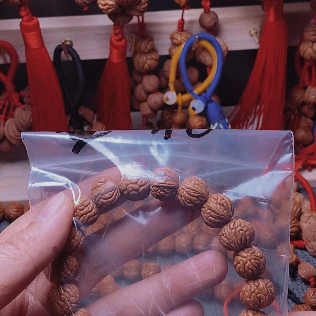 壹***亿吊坠桃核桃枭手串