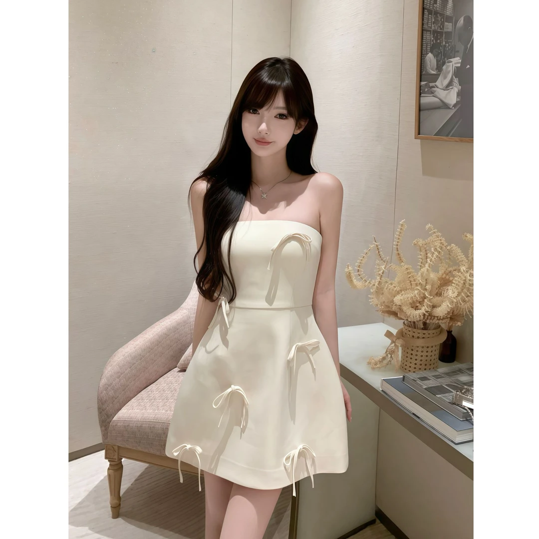 法式气质女神2025春季新款性感一字肩收腰显瘦蝴蝶结高级感连衣裙