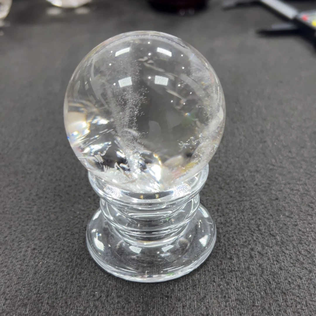 莎***z石材天然白水晶球摆件