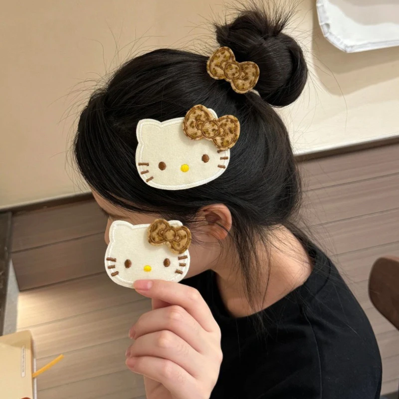 新款可爱KT蝴蝶结魔术贴少女卡通侧边碎发整理刘海贴秋冬百搭发饰