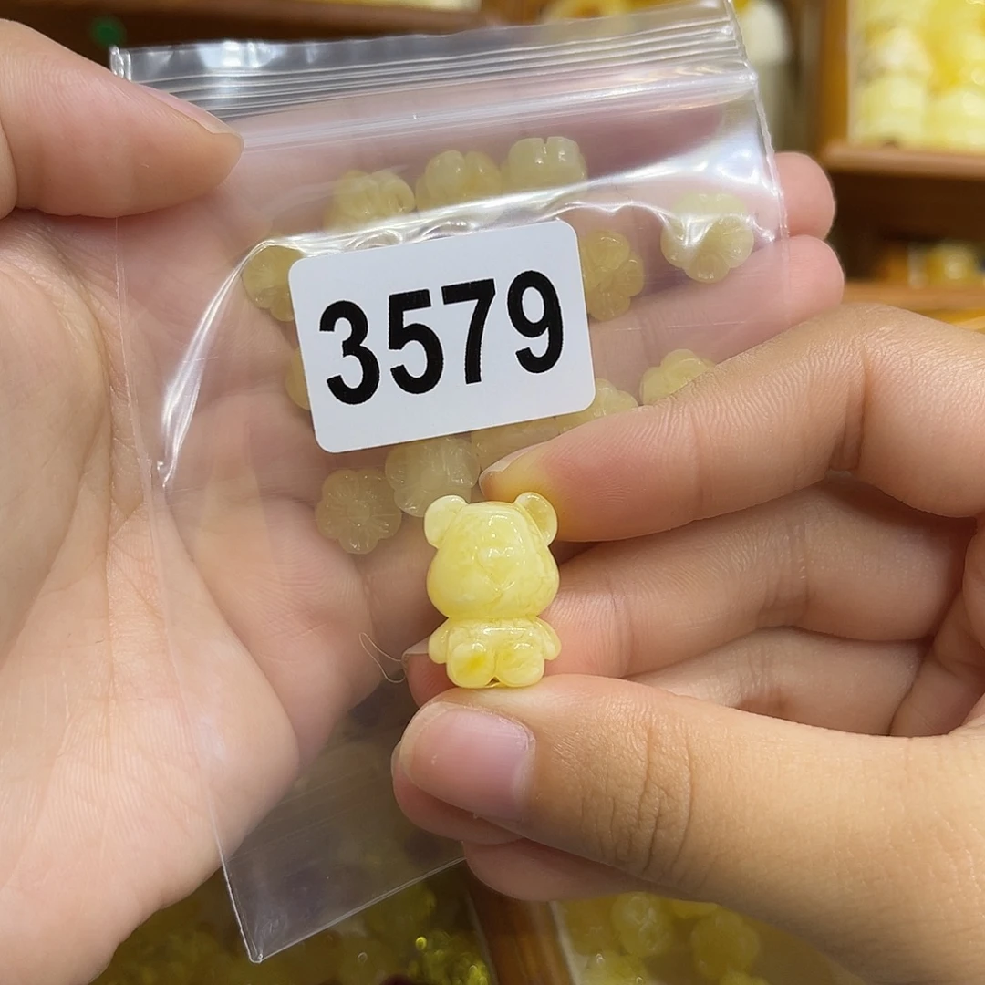 秃***使琥珀未镶嵌珠宝奇石