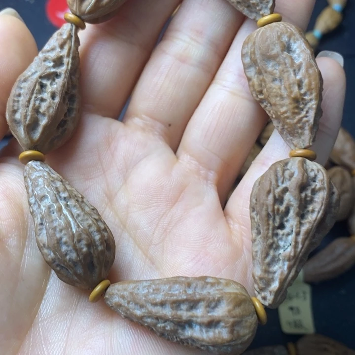 郝*哥文玩异形秋子手串