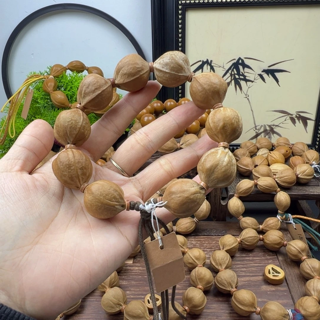 冒***人橄榄核手串23.26梅林铁核