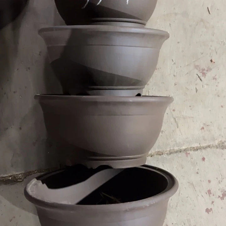 紫砂花盆110.4。  35-17。
