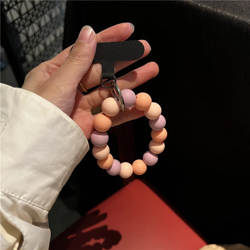 高级感多巴胺甜美风马卡龙色系弹力硅胶串珠手拎圆环手机挂件挂链