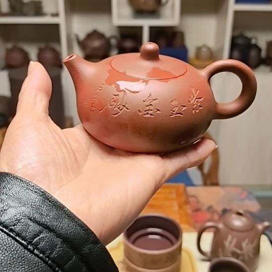 紫砂茶宠半月壶140cc手工制作双面刻绘青水泥