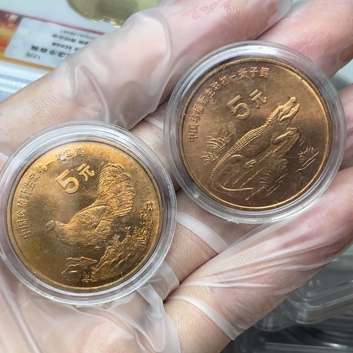 其他普通金属有点氧化的98年动物币一对