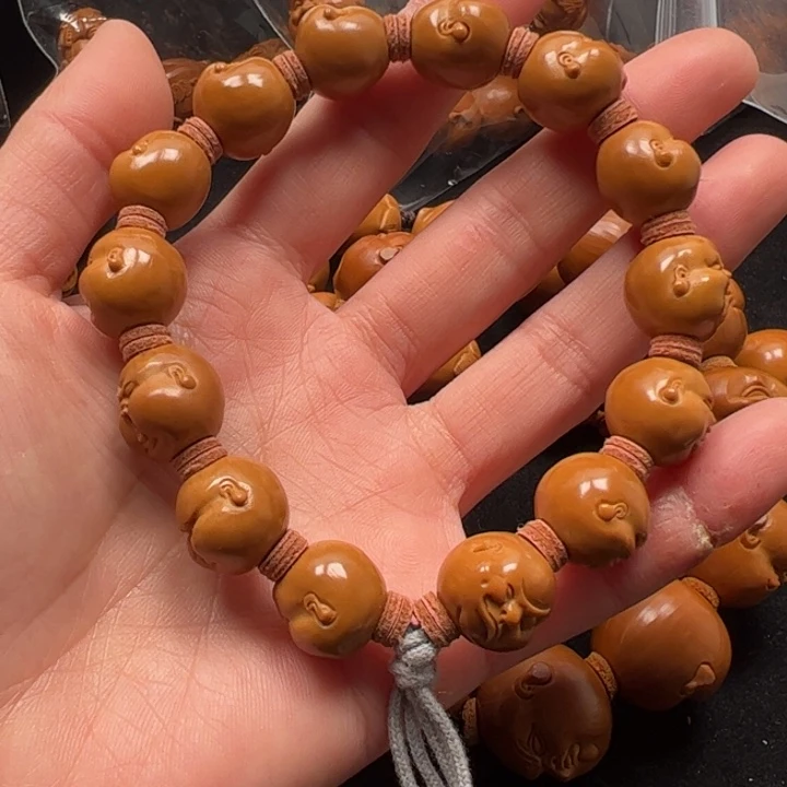 。***.橄榄核手串15百态