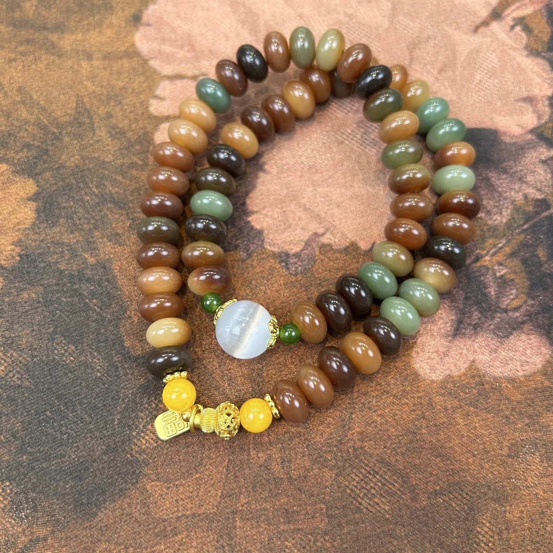 S1320-敦煌算盘菩提4*8mm+猫眼石隔珠+镂空葫苫福牌