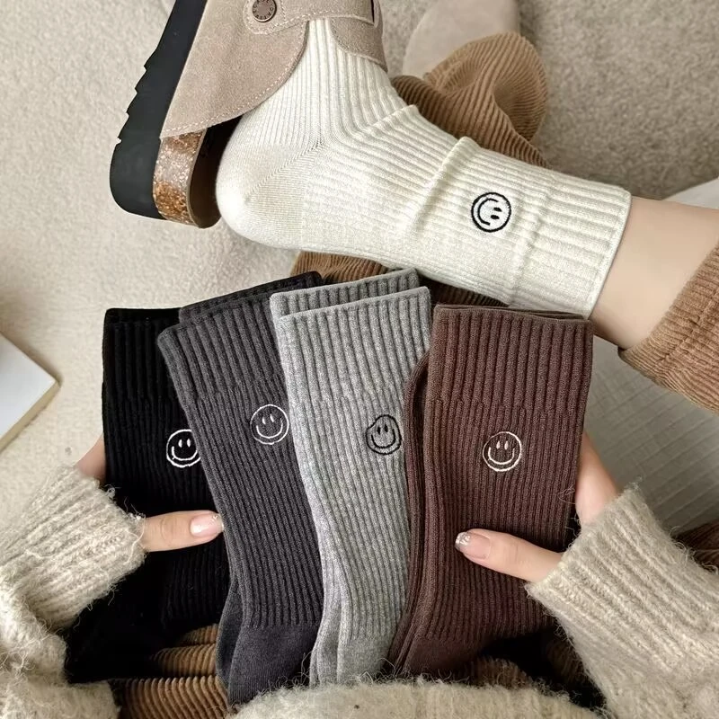 韩系笑脸羊绒袜子女秋冬款2025新款加绒加厚保暖长筒堆堆袜高腰袜
