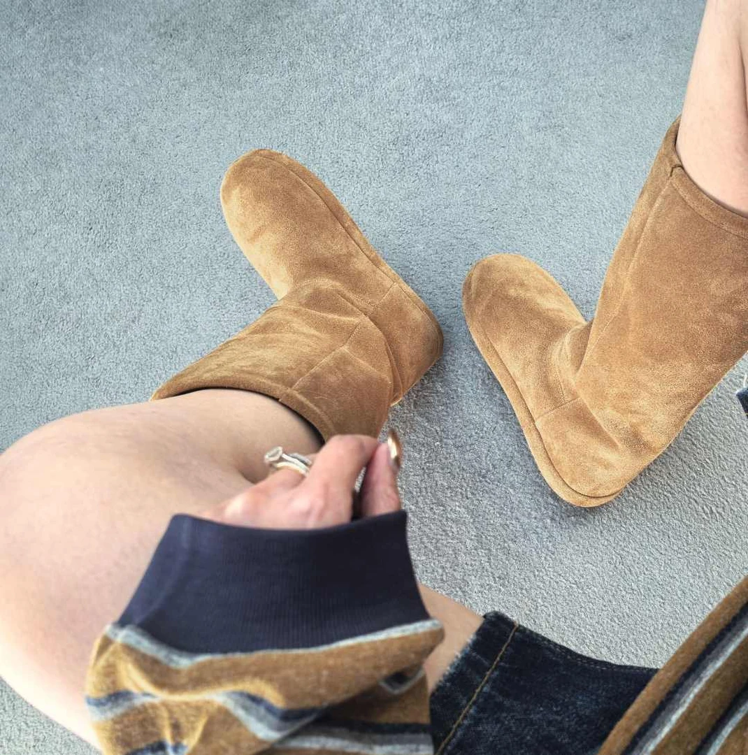 萝茜妮嫚秋冬新款时尚真皮真毛厚底保暖套筒骑行女士百搭雪地靴