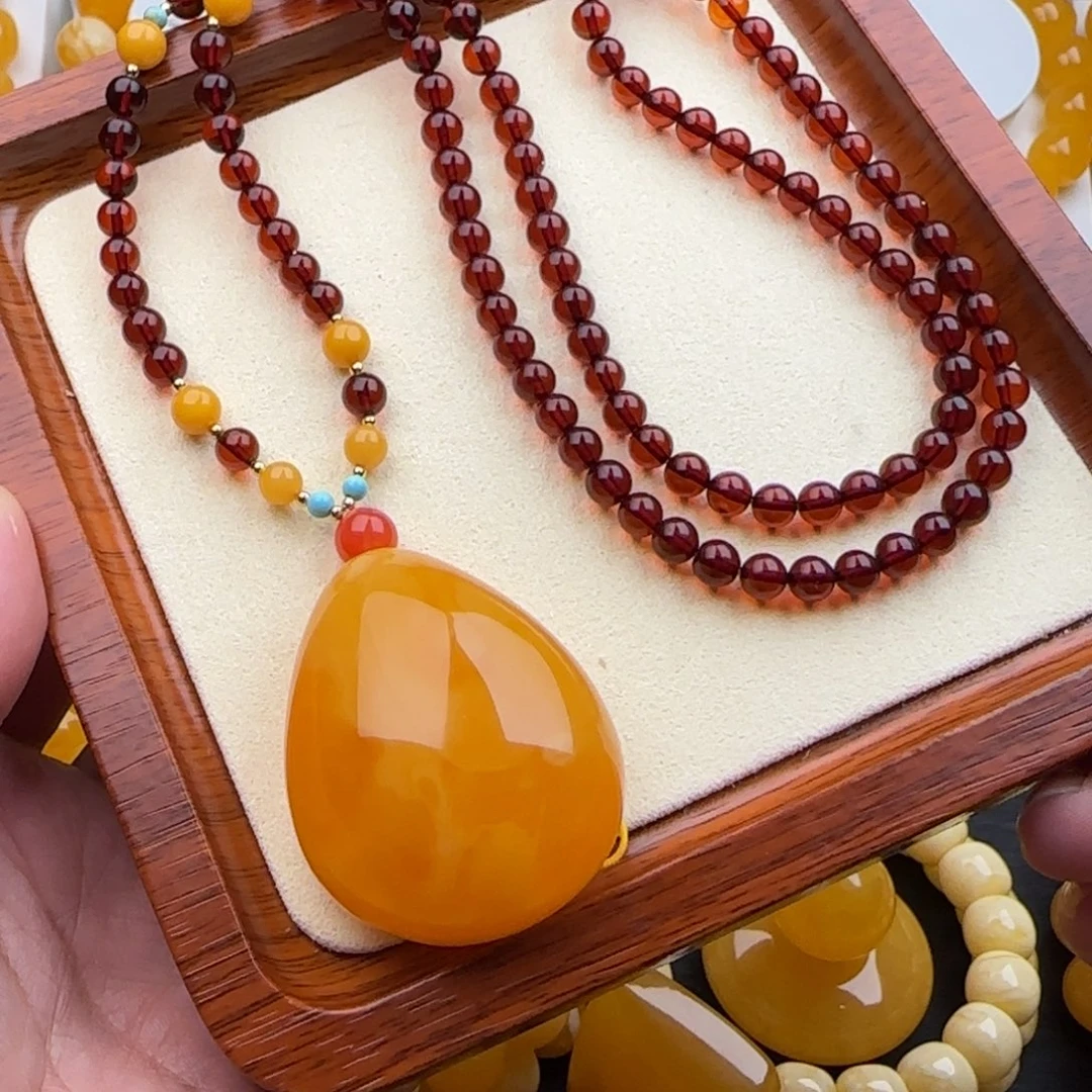 琥珀未镶嵌颈饰焦皮高品质红花蜡吊坠