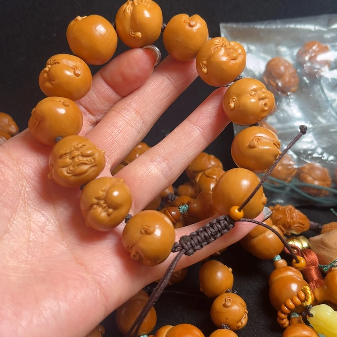 大***牙吊坠橄榄核人生百态