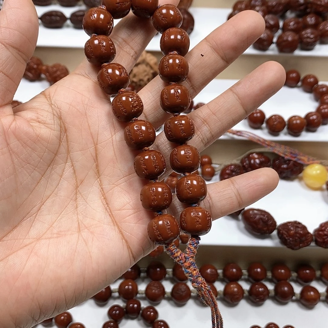 橄榄核吊坠袁*志橄榄核