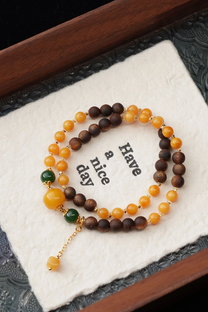 沉香黄昏晓 天然莺歌绿棋楠6mm圆珠双圈手串