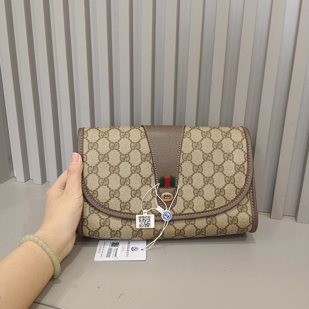 95新 GUCCI/古驰 兔兔奢轩轩/古驰手拿包/250329026