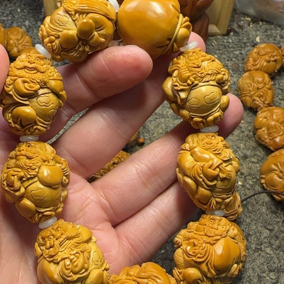 橄榄核吊坠孬*……………………