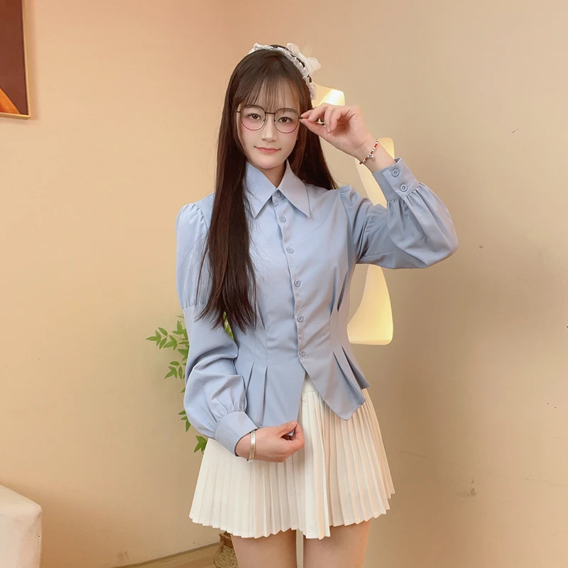 蓝色泡泡袖收腰衬衫女2025春款长袖设计感小众短款内搭打底衫上衣