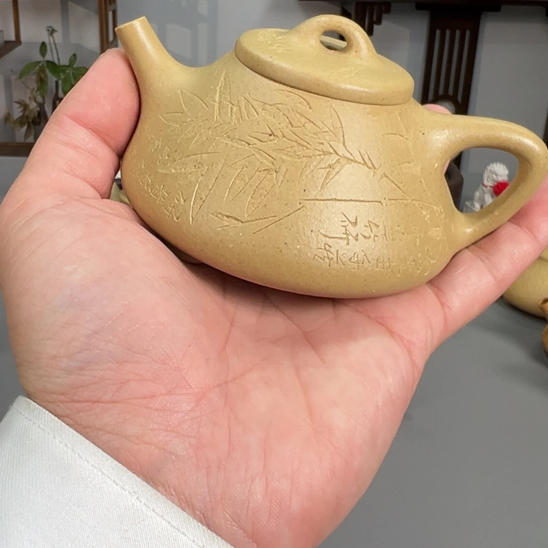 ****紫砂茶壶梨皮刻绘子冶微微瑕