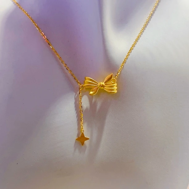 水贝柜台现货黄金老花蝴蝶结T足金9