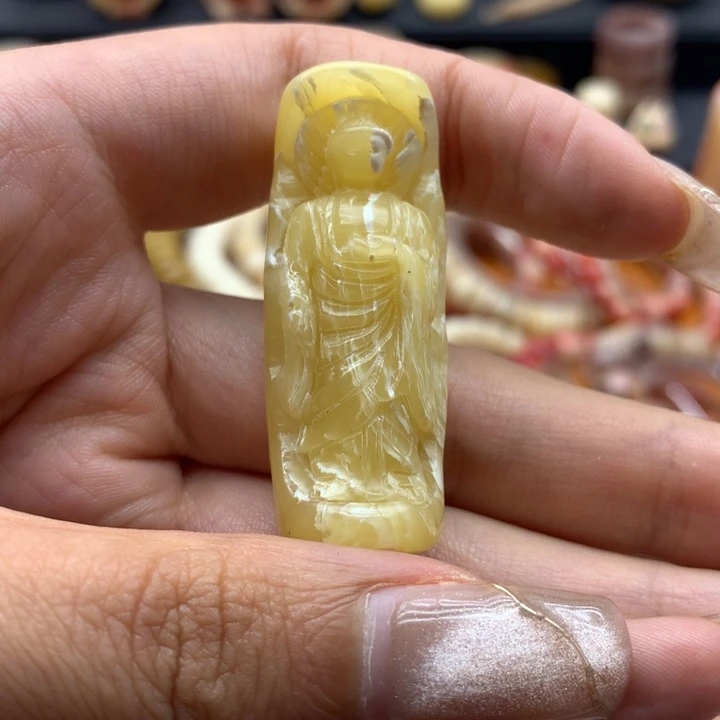 合金牛角雕刻佛像