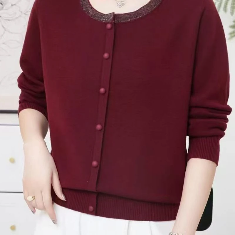 1722款-冬季新款设计感圆领亮钻皮扣毛衣